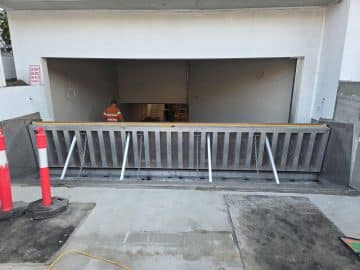 passive-tilting-flood-barrier-install-underground-